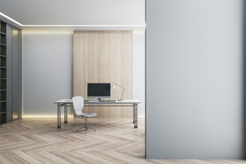 Fototapeta premium Desk with empty black computer monitor in modern white office interior with daylight, wooden flooring and empty mockup place on wall. Mock up, 3D Rendering.