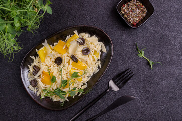 Small pasta with vegetables and pea sprouts