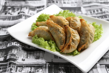 deep fried pork dumpling guo tie jiaozi dim sum in white black background dim sum snack halal menu