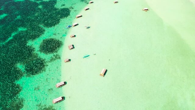 Manlawi Sandbar floating cottages in Caramoan Islands. A floating native cottage on a sandbar in the tourist island of Caramoan in the Philippines