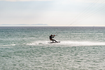 surfer wakeboarding on the sea