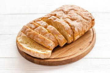 Fresh bread ciabatta loaf close up. Bakery background