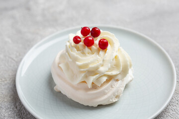 Pavlova is a meringue-based cake topped with fruit and whipped cream