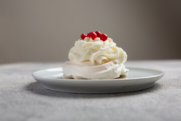 Pavlova is a meringue-based cake topped with fruit and whipped cream