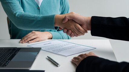 Fototapeta premium office job interview Highlight tips for writing a resume. Employers review resumes of skilled applicants and are considering applications. in hiring decisions, job search ideas