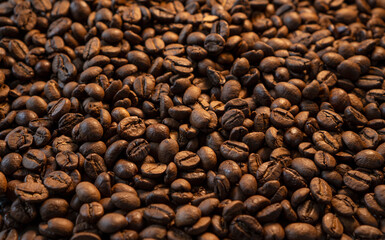 Coffee beans background with soft warm light