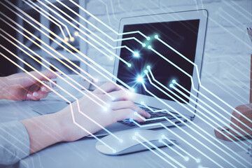 Double exposure of woman hands working on computer and data theme hologram drawing. Tech concept.
