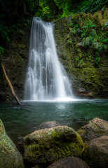 Fototapeta na wymiar Beautiful cascading waterfall on Sao Miguel, Azores
