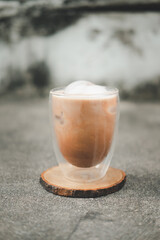 Iced Mocha coffee with ice in a glass with double wall