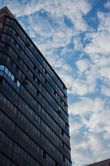 Fototapeta premium office glazed building against the sky