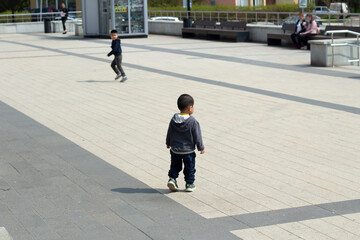 The baby's in the square. The preschooler got lost in the city.