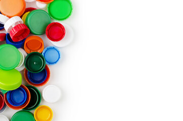 Group of multicolored bottle caps isolated