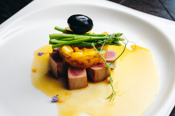 tuna fillet with pear tartar and asparagus