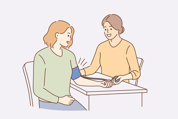 Medical checkup of blood pressure concept. Female doctor making blood pressure and health examination in clinic for young woman patient vector illustration 