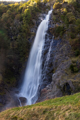 Fototapeta na wymiar Huge Waterfall at Merano. Alp Italy.
