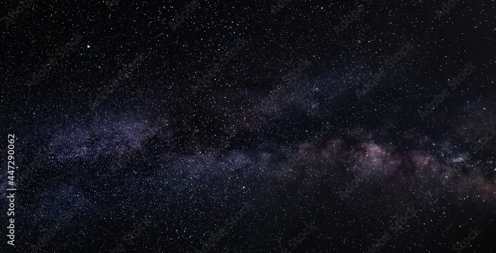 Wall mural milky way in the night sky