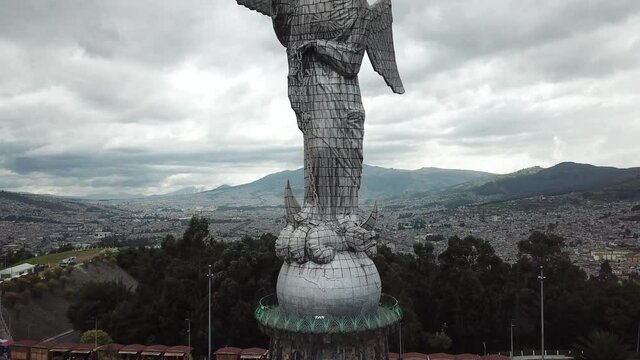 DLOG Flat Aerial drone from the Panecillo, old town Quito- Ecuador. This statue represents the Virgin of Panecillo. It is located on the top of the omonymous hill in Quito
