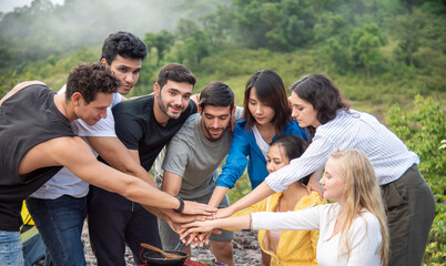 Group of friends male and female Joining hands for unity,concept teamwork
