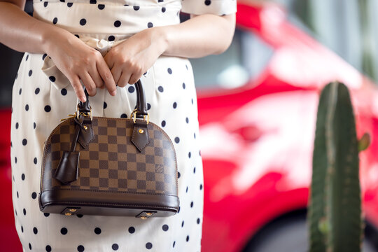 Woman louis vuitton bag in hi-res stock photography and images - Alamy