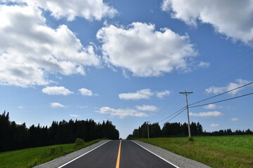 A new road under a cloudy sky, Québec, Canada