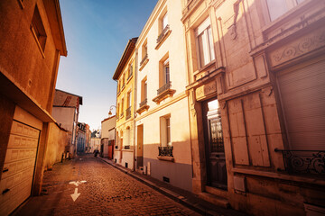 Reims downtown tiny street with old buildings