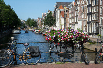 Fototapeta premium Traditional network of waterways and canals in the City of Amsterdam, Netherlands, Europe