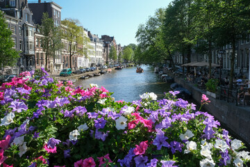 Fototapeta na wymiar Traditional network of waterways and canals in the City of Amsterdam, Netherlands, Europe