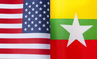 fragments of the national flags of the United States and Myanmar in close-up