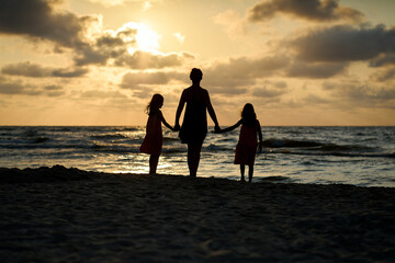 Family vacation sunset happy together at the beach 