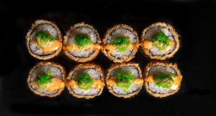 rolls isolated on black background. Photo for the menu.