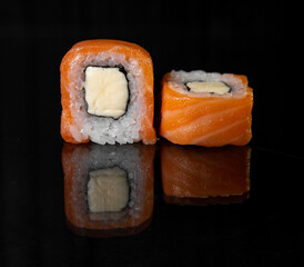 the rolls with reflection on black background