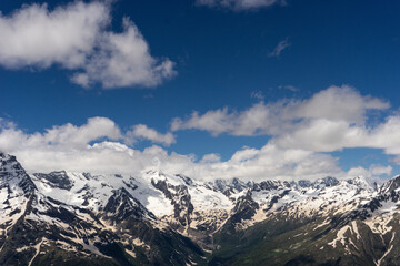 Obraz premium Great nature mountain landscapes. Fantastic perspective of caucasian snow inactive volcano Elbrus and clearly blue sky background. Russia