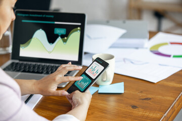 Young woman, manager working at office. Using laptop, modern gadgets. Remote working. Workplace at comapny, home with PC, devices.