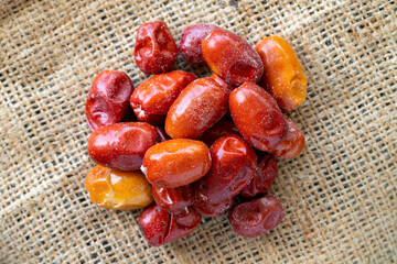 silverberry on white fabric. Fresh raw silverberry fruits