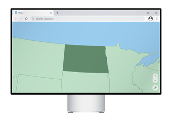 Computer monitor with map of North Dakota in browser, search for the country of North Dakota on the web mapping program.