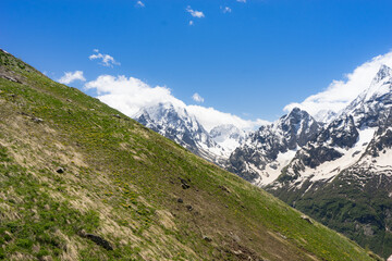 Obraz premium Great nature mountain landscapes. Fantastic perspective of caucasian snow inactive volcano Elbrus and clearly blue sky background. Russia