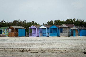 Naklejka premium rustic beach huts on the sand at The Witterings in England