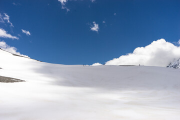 Great nature mountain landscapes. High mountains under snow. Scenic View Of Mountains Against Blue Sky.