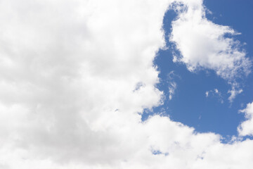 White, Fluffy Clouds In Blue Sky. Background From Clouds.