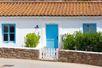 Traditional cottage at Greve de Lecq, north Jersey, Channel Islands, Britain, used as holiday or...