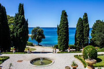 View of Miramare Castle Garden on a Sunny Day
