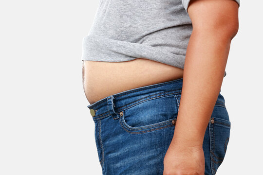fat man wearing gray shirt with a lot of weight Take off the shirt to show the big belly. have health problems There is a risk of various diseases. weight loss concept. Clipping Path