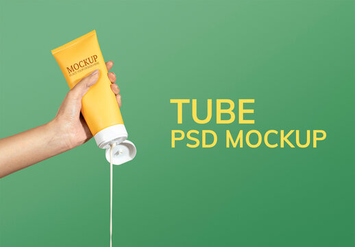 Woman Squeezing Cream from a Yellow Tube Mockup