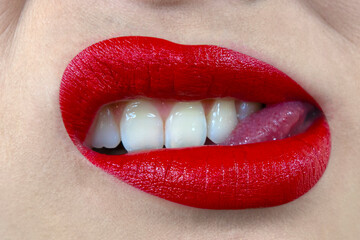 Sensual. sexy lips with red lipstick and white teeth