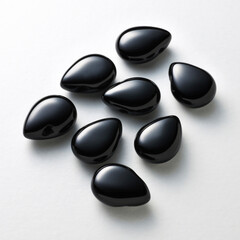 shiny onyx agate gemstones on white background.