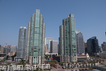 Fototapeta na wymiar Cityscape of San Diego Showing the Metro Train and Staion Arriving 