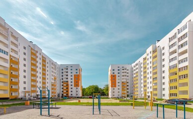 Facade of modern colorful multi-storey buildings in the city. Space for text. High quality photo