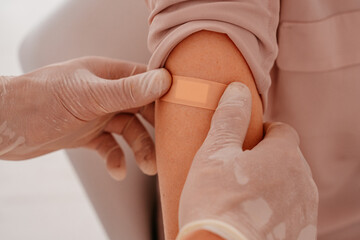 Patient with patch on the arm did the covid-19 vaccine