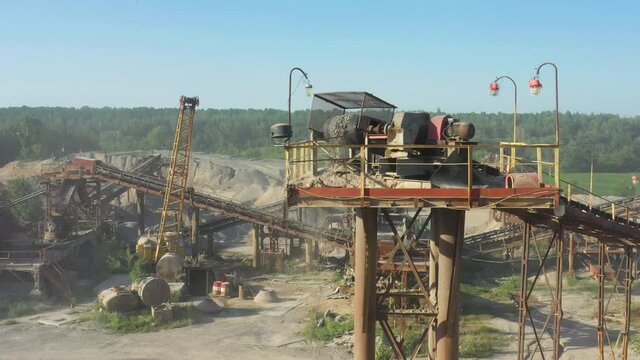 Quarry for the extraction of granite. Granite quarry. Extraction of granite. Open cast mine. mining industry. Stone Quarrying - Aerial view
