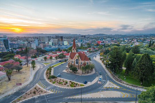 Aerial view of historical landmark Christ Church aka Christuskirche at sunset in Windhoek, the capital and largest city of Namibia.